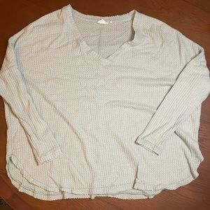 Mint colored knit top.